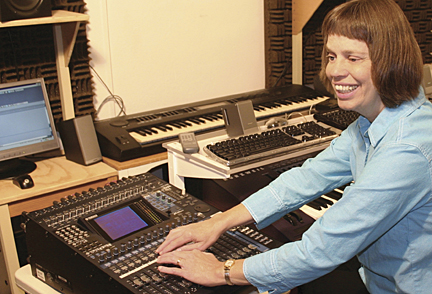 Picture: Veronica at the mixing console in her studio. This picture appears on the dedication panel of the digipak.